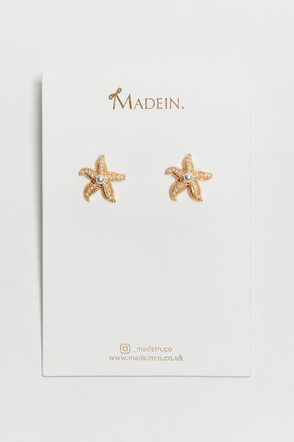 Madein Pearl embellished Gold starfish earrings