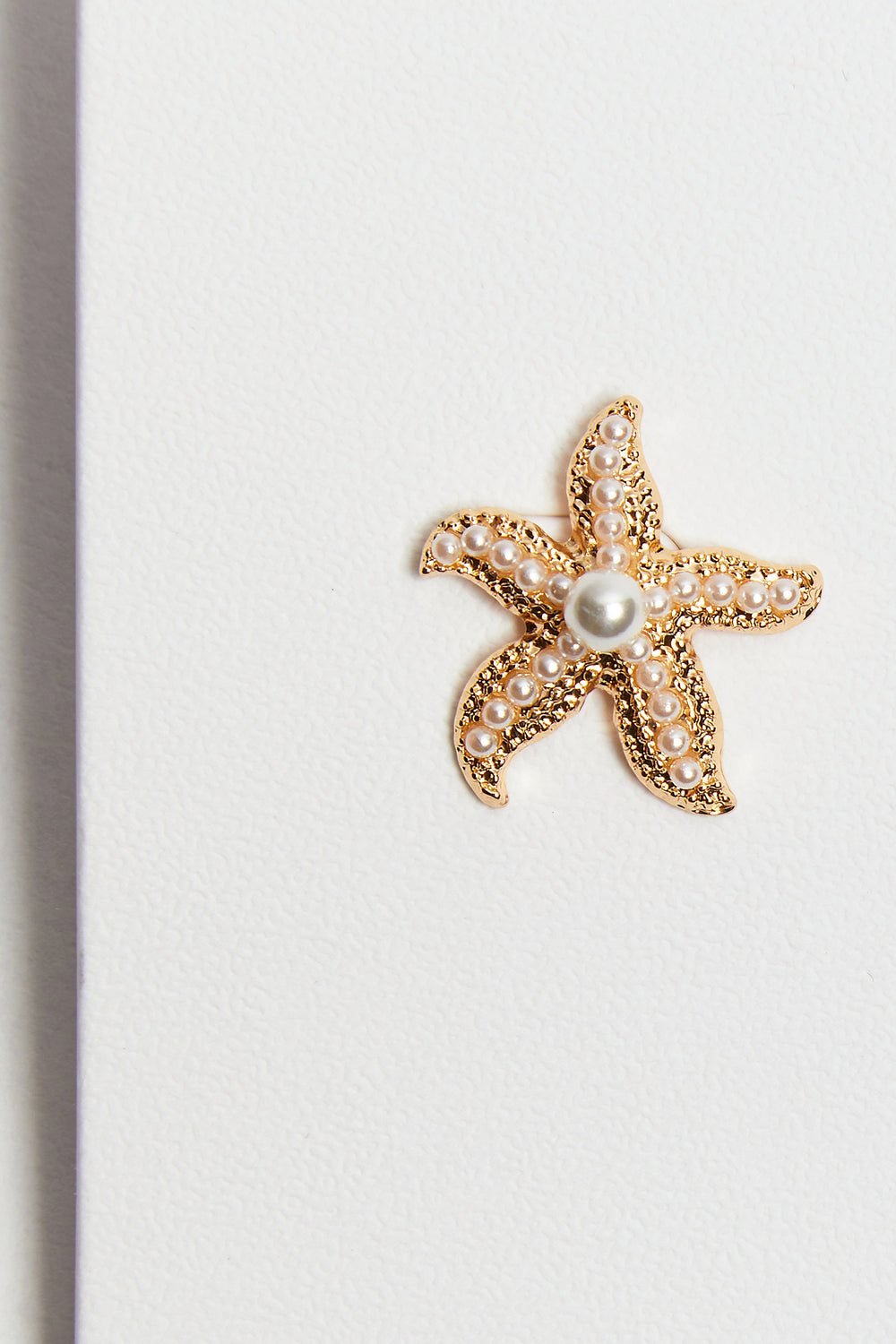 Madein Pearl embellished Gold starfish earrings